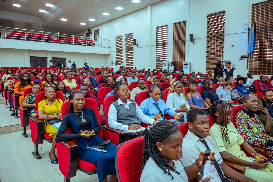 Attendees listening attentively in a conference hall