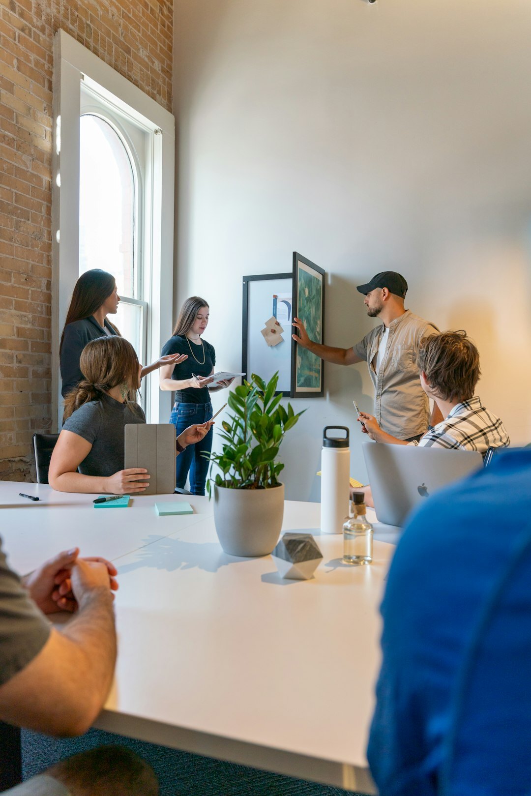 Business professionals meeting around a table in an office