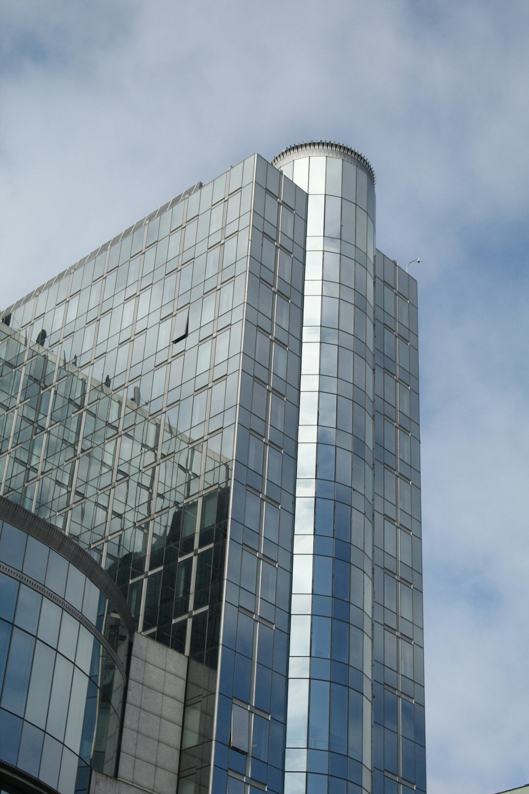 Modern glass office tower in Brussels business district